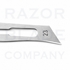 Close-up of the No. 23 stainless steel contour blade showing its mounting slot, rear profile, and engraved 23 marking
